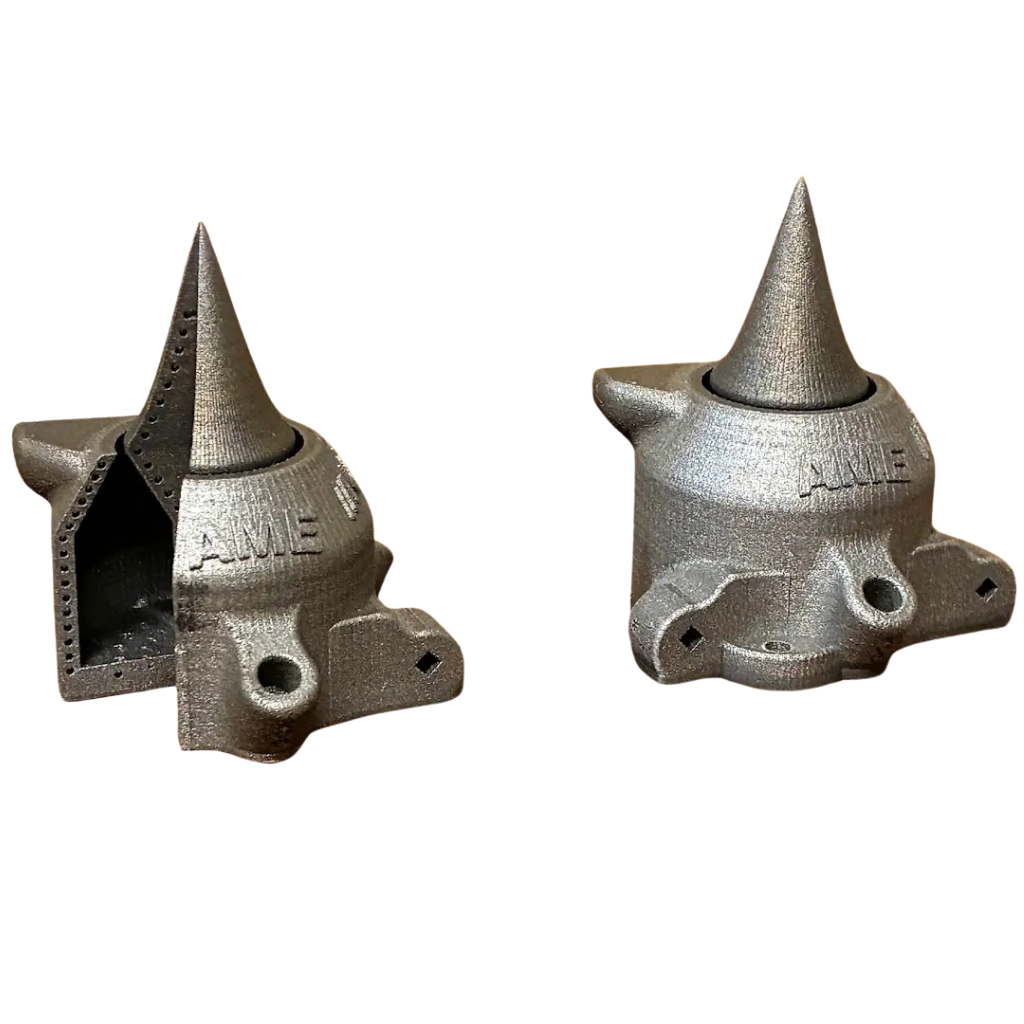 Two printed injector bodies with AME lettering, one cut away to show its internal channels